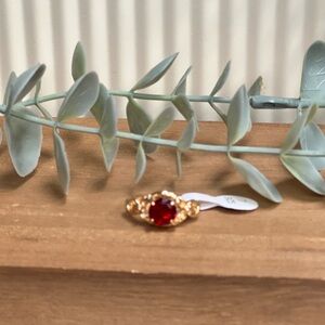 Gold CZ Ring with Red Gemstone